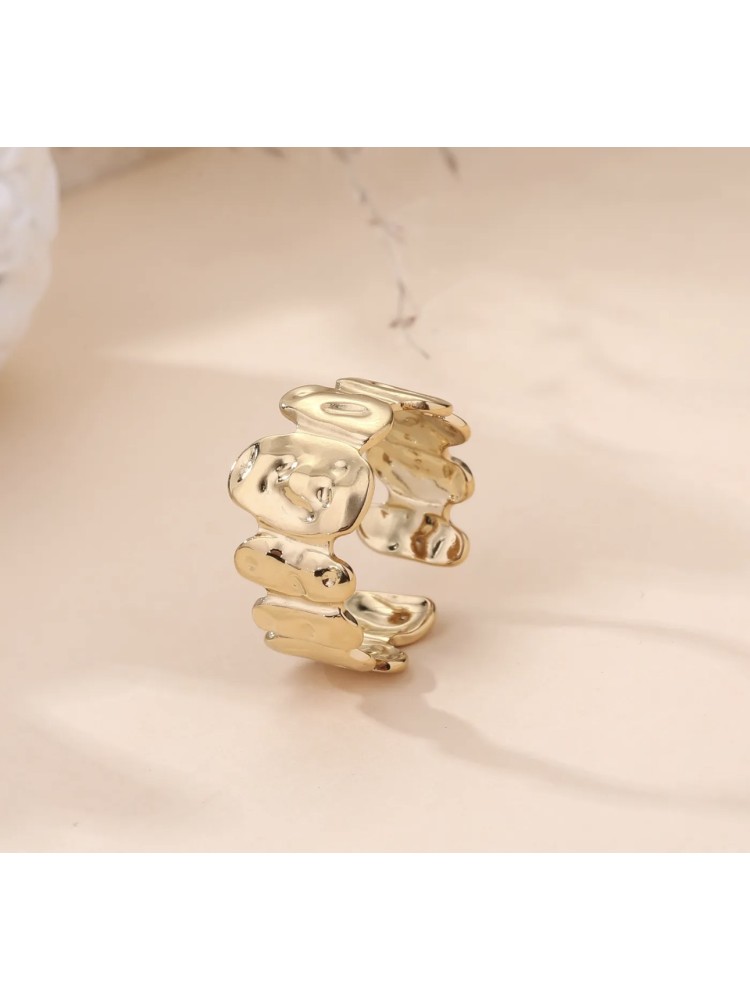 Bague dorée motifs abstraits 